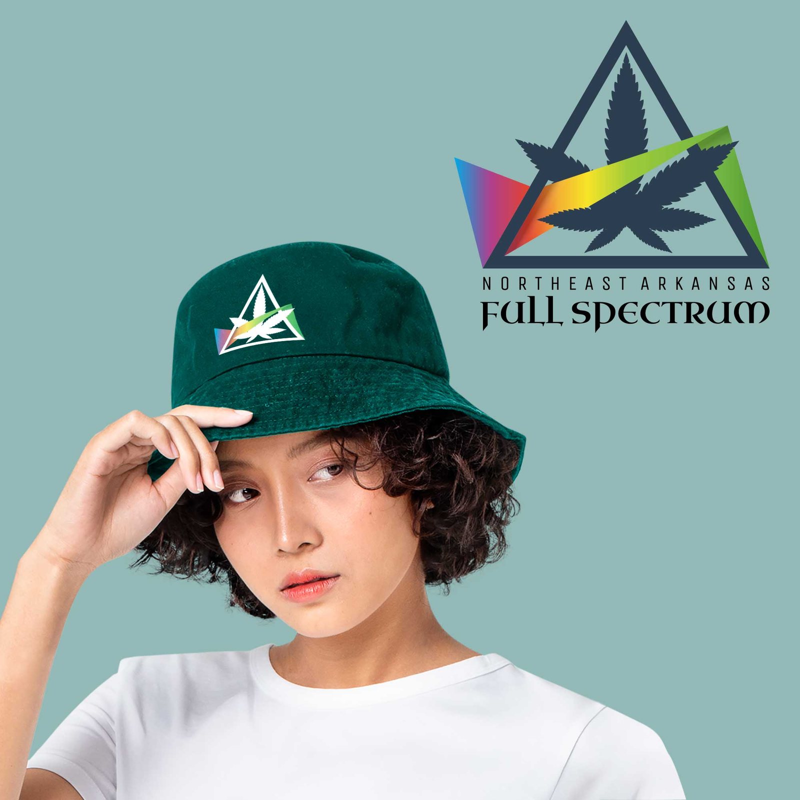 A person in a green bucket hat embroidered with the NEA Full Spectrum mark, the full logo set beside them on a teal background.