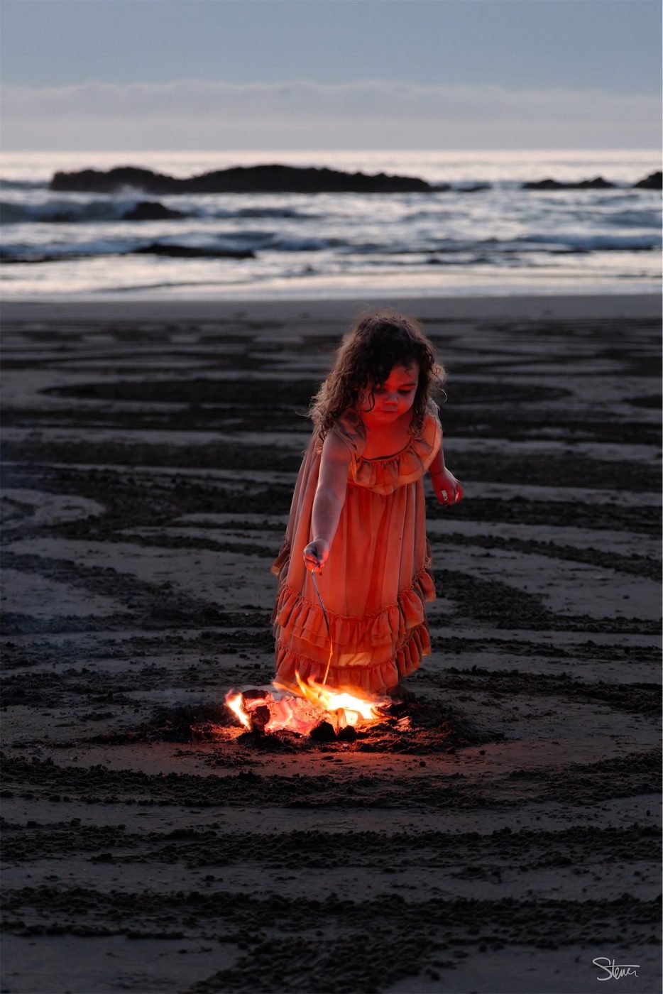 Girl On Beach With Fire.
