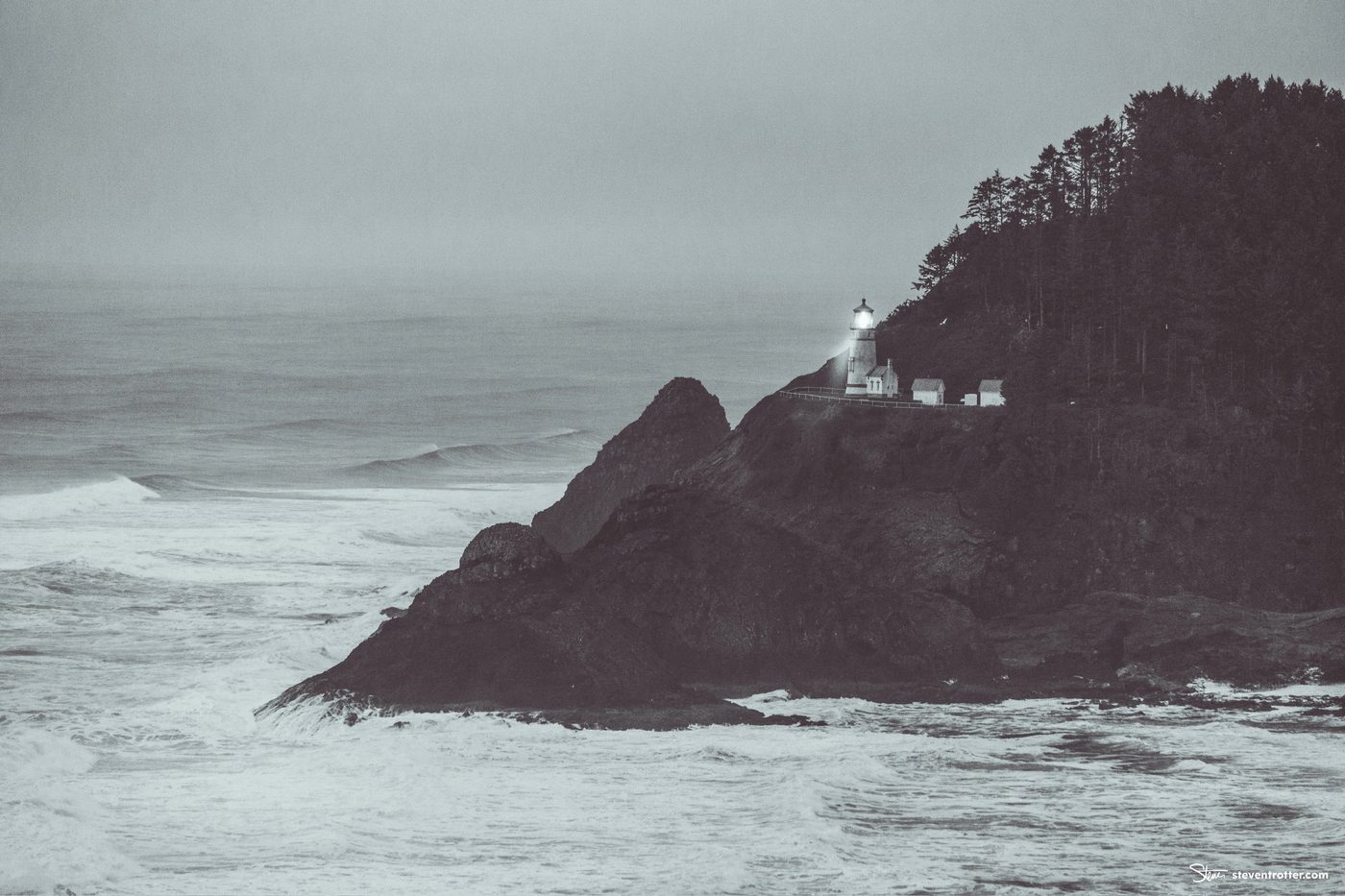Lighthouse On Rocky Coast.