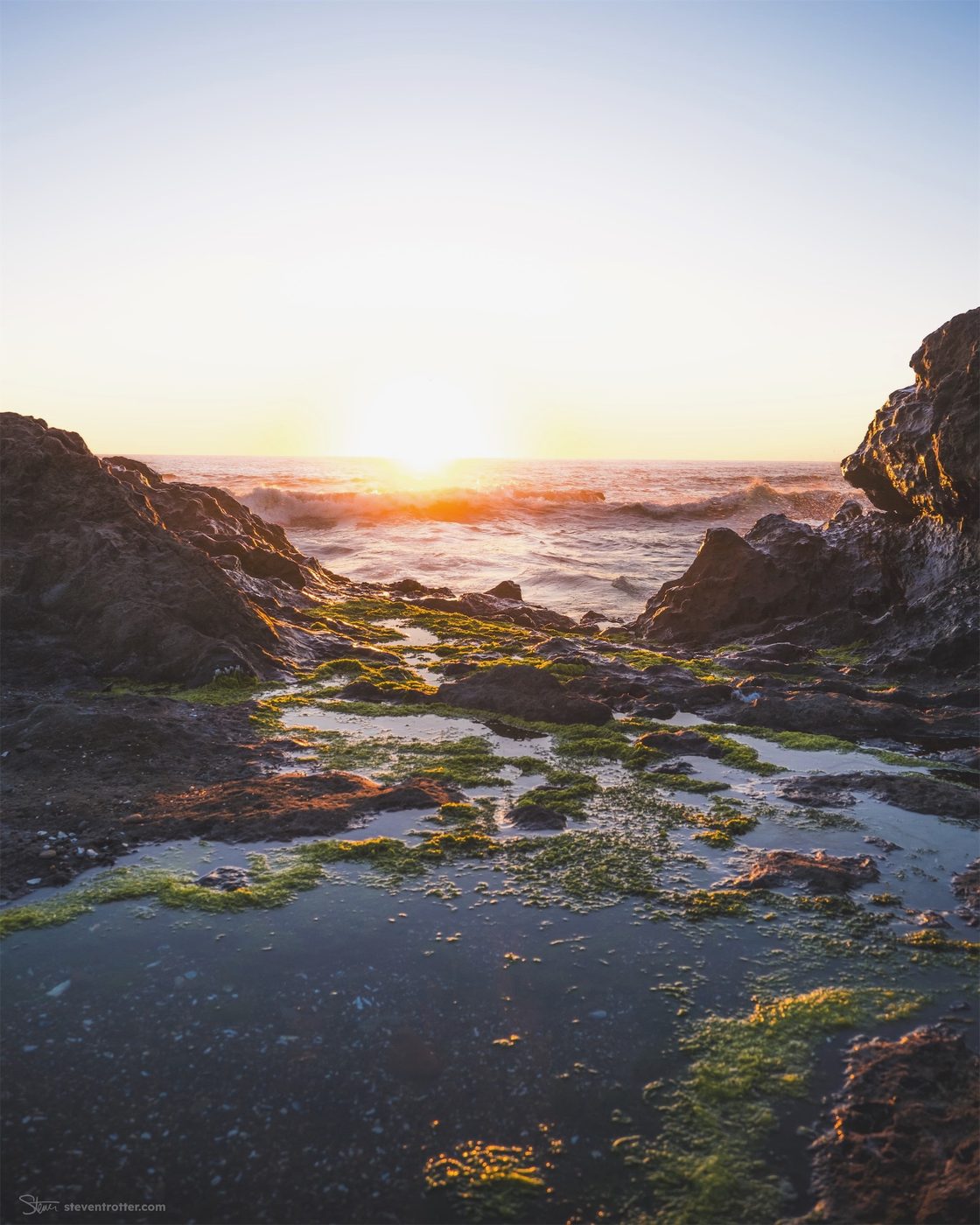 Sunset Over Rocky Shore.